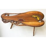 LOW TABLE, of tree section form redwood, rusticated, with yellow and red butterflies carved and