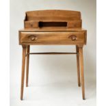 ERCOL WRITING TABLE, by Lucian Ercolani, 1970's, elm, with galleried superstructure, frieze drawer