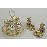 SALT AND PEPPER 'CHICK' SHAKERS, and egg cruet, silver plated alon with a pair of white metal door