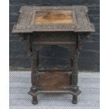 OCCASIONAL TABLE, 19th century Burmese Padoukwood with eared square top and carved figure