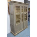 BIBLIOTHEQUE, late 19th century French in a grey and cream distressed finish with glazed doors