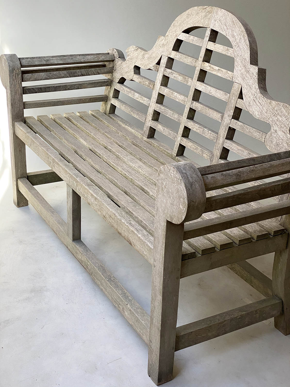 LUTYENS STYLE GARDEN BENCH, silvery weathered teak and of substantial slatted construction after a - Image 5 of 5