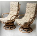 ANGRAVES RECLINING LOUNGER ARMCHAIRS, a pair, rattan and cane bound, revolving and reclining, 65cm