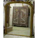 OVERMANTEL, Victorian giltwood and gesso with arched barley twist frame, 133cm H x 111cm W. (with