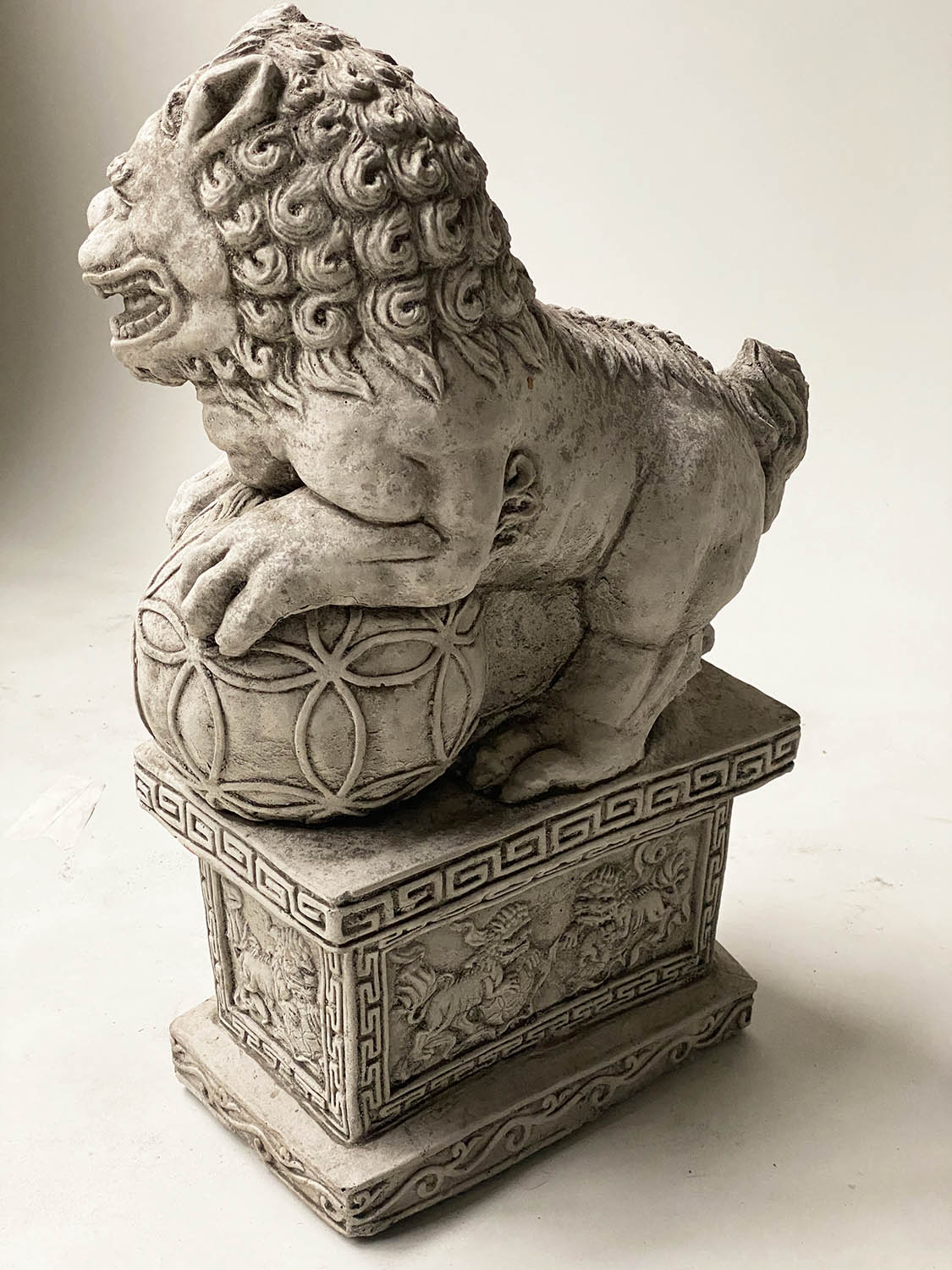 GARDEN DOGS OF FOO, an opposing pair, weathered, reconstituted stone with Greek key and lion - Image 3 of 6