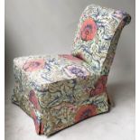 SLIPPER CHAIR, Victorian ebonised supports with horn castors and Bloomsbury style poppy print fitted