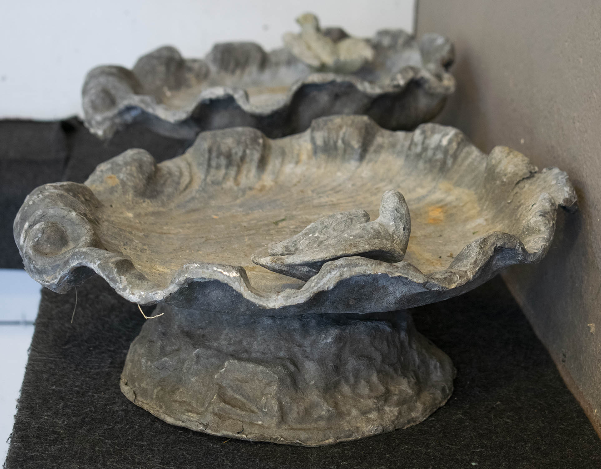 BIRD BATHS, lead of scallop shell form on rocky bases, 17cm H x 36cm x 36cm. (2) - Image 3 of 3