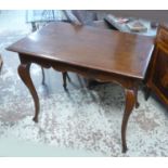 CENTRE TABLE, 19th century French Provincial walnut with a shaped apron on slender cabriole