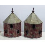 BIRD HOUSES, a pair, painted metal, house 32cm W x 16cm D x 49cm H. (2)