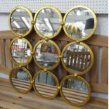 BUBBLE WALL MIRROR, 1960's French style, gilt metal frame, 69cm x 69cm.