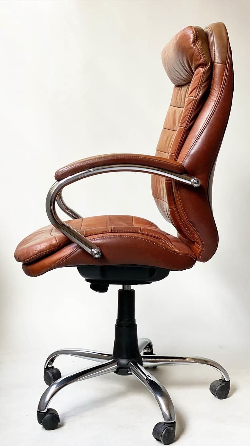 REVOLVING AND RECLINING DESK CHAIR, 1970's, stitched tan leather, on a djustable base, with castors, - Image 2 of 7