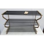 SHOE RACK, 1950's French style, gilt metal with black painted accents, 83cm x 34cm x 54cm.