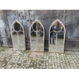 ARCHITECTURAL GARDEN WALL MIRRORS, a set of three, Gothic style, arch top design, 122cm x 56cm. (3)