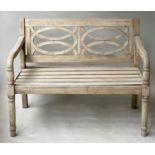 GARDEN BENCH, colonial veranda style weathered teak with circles slatted back and downswept arms,