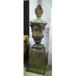 GARDEN URN ON PLINTH, Classical style weathered simulated stone with swag decoration, approx 239cm