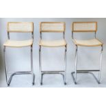 MARCEL BREUER INSPIRED CESSCA STYLE BAR STOOLS, a set of three, cane panelled with chromium