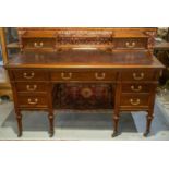 MAPLE & CO DESK, late Victorian walnut, circa 1895, with leather top and nine drawers, (stamped),