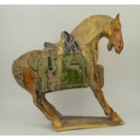 CHINESE SANCAI-GLAZED POTTERY HORSE, 50cm H x 50cm W. (possiby Tang AD 618-907) (missing tail)
