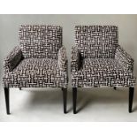 ARMCHAIRS, a pair, 1960's style with black and white velvet plush upholstery and black round section