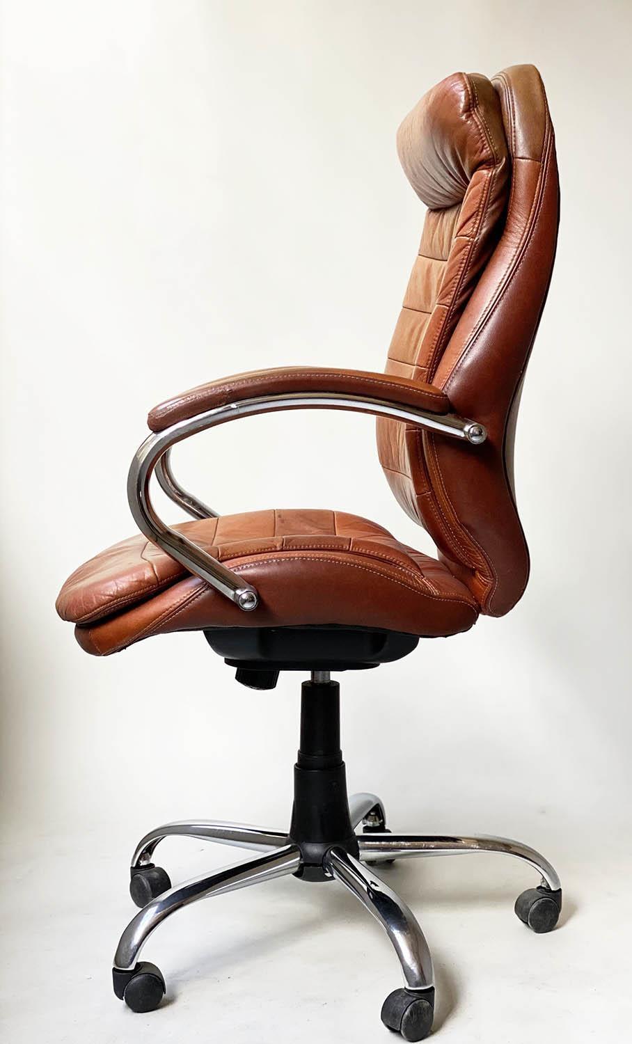 REVOLVING AND RECLINING DESK CHAIR, 1970's, stitched tan leather, on a djustable base, with castors, - Image 7 of 7