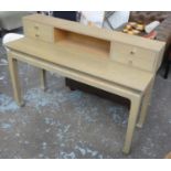 OKA DESK, with a raised superstructure of four drawers, 140cm W x 95cm H x 50cm D.