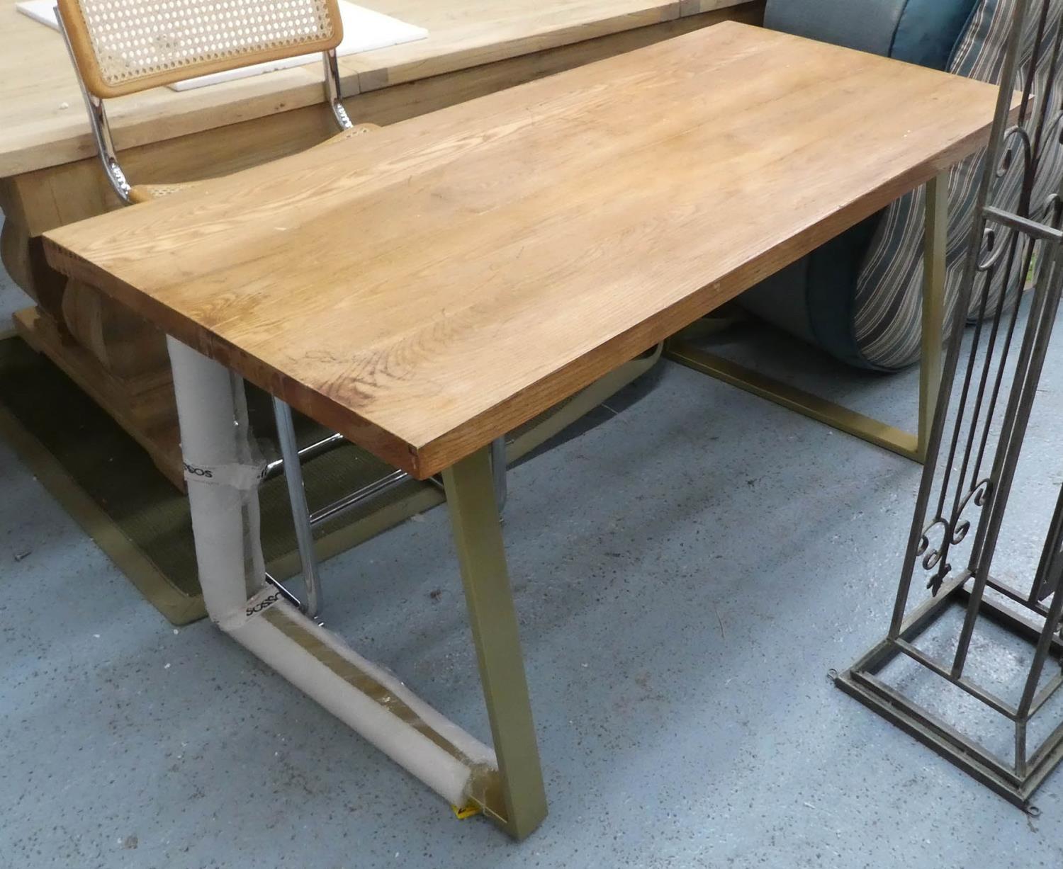 DINING TABLE, contemporary bespoke design, with gilt metal trapeze supports, 152cm x 70cm x 77cm.