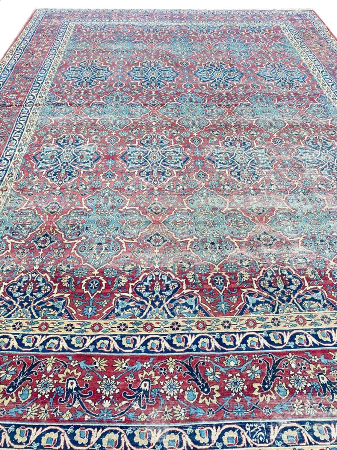 ANTIQUE PERSIAN KIRMAN LAVER CARPET, 375cm x 270cm.