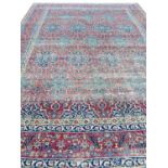 ANTIQUE PERSIAN KIRMAN LAVER CARPET, 375cm x 270cm.