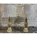 TABLE LAMPS, a pair, gilt metal and onyx with shades, 60cm H. (2)