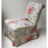 SLIPPER CHAIR, Victorian ebonised supports with horn castors and Bloomsbury style poppy print fitted