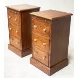 BEDSIDE CHESTS, a pair, Victorian burr elm each adapted with brushing slide and three drawers,