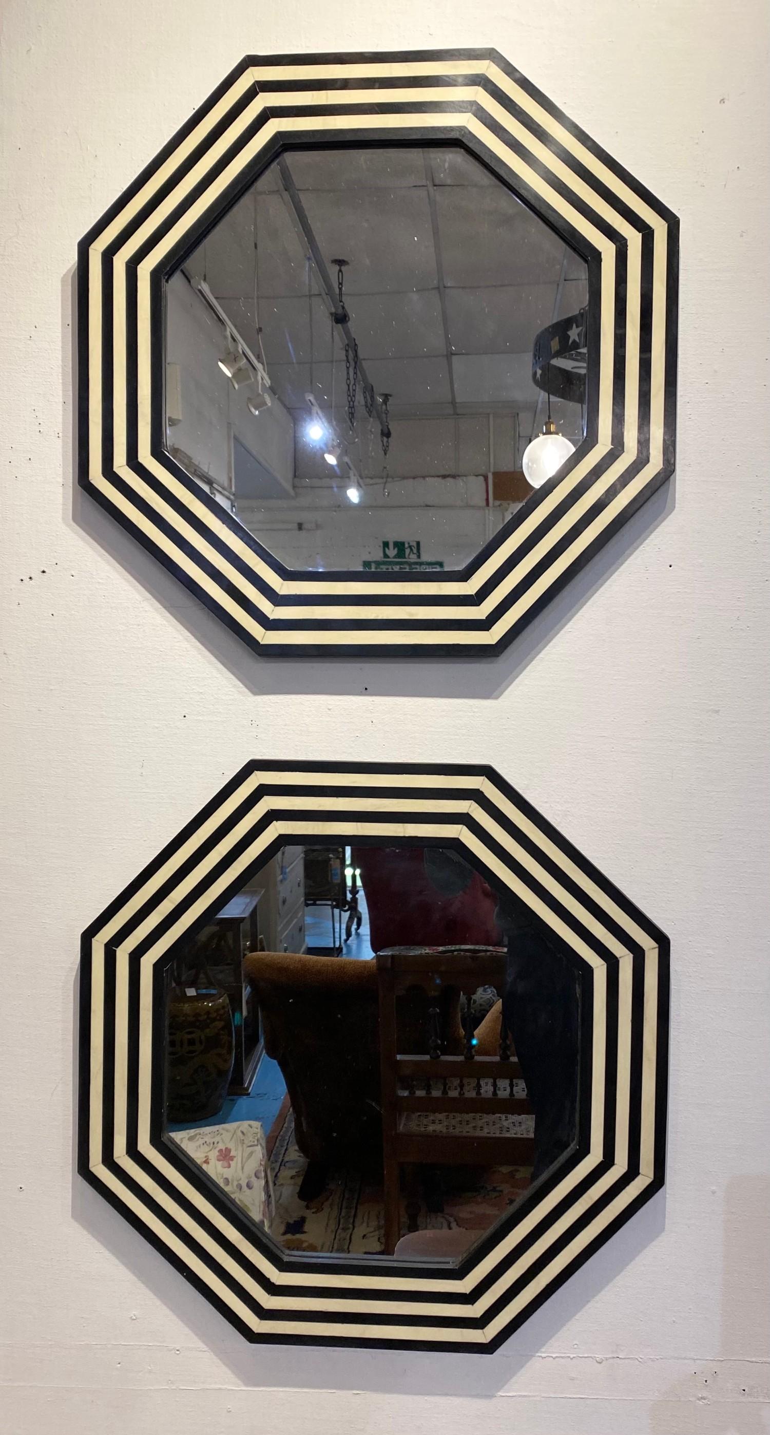 WALL MIRRORS, a pair, 1970's Italian design, octagonal inlaid frames, 61cm diam. (2)