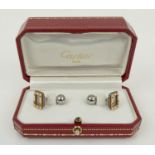 CARTIER CUFFLINKS, Santos collection, stainless steel with 18ct gold border set with screw motif