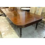 DINING TABLE, George IV mahogany extending with three extra later leaves on reeded turned supports