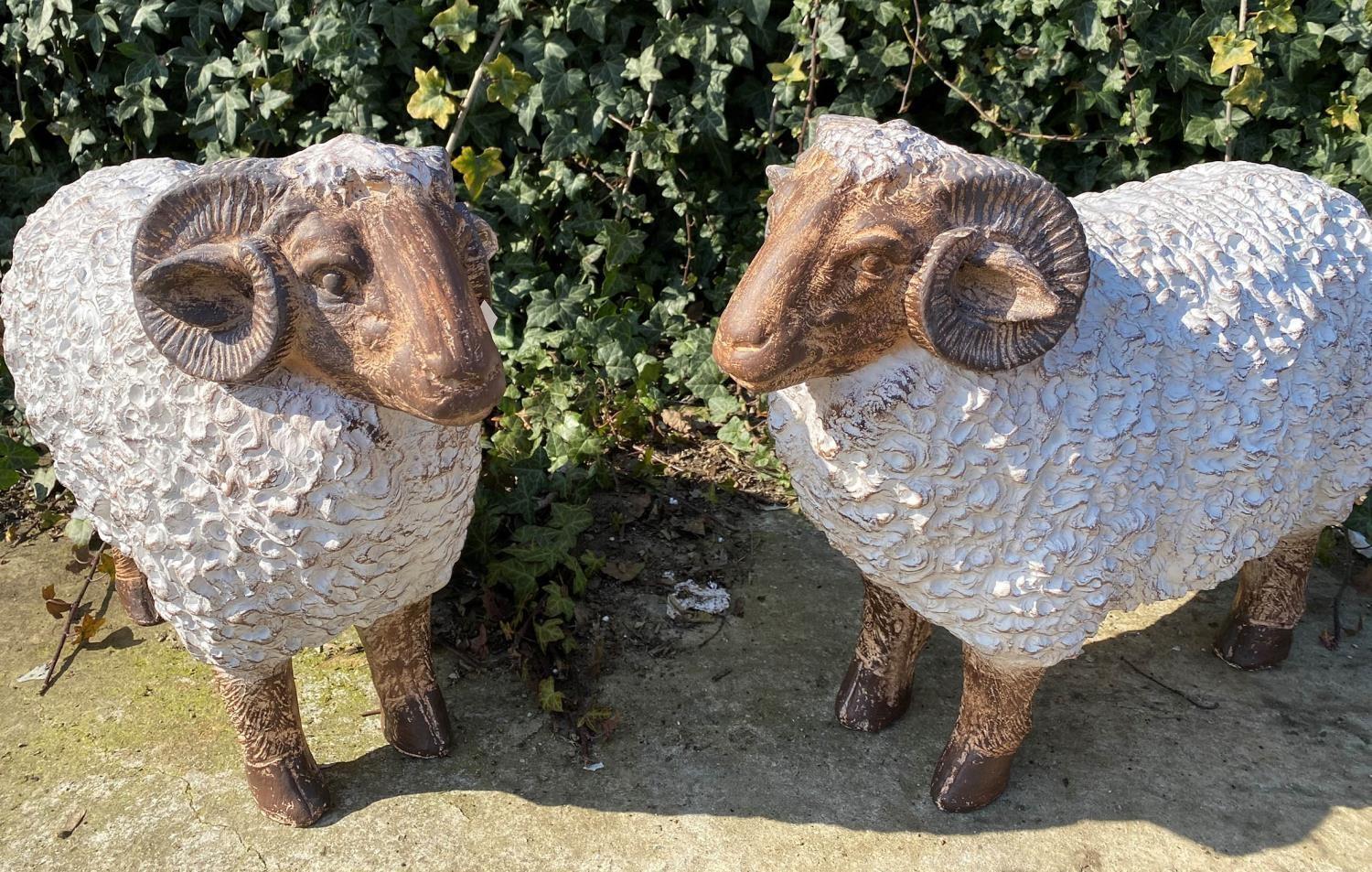 CONTEMPORARY SCHOOL, a sculptural pair of rams, polychrome finish, 49cm H. (2)