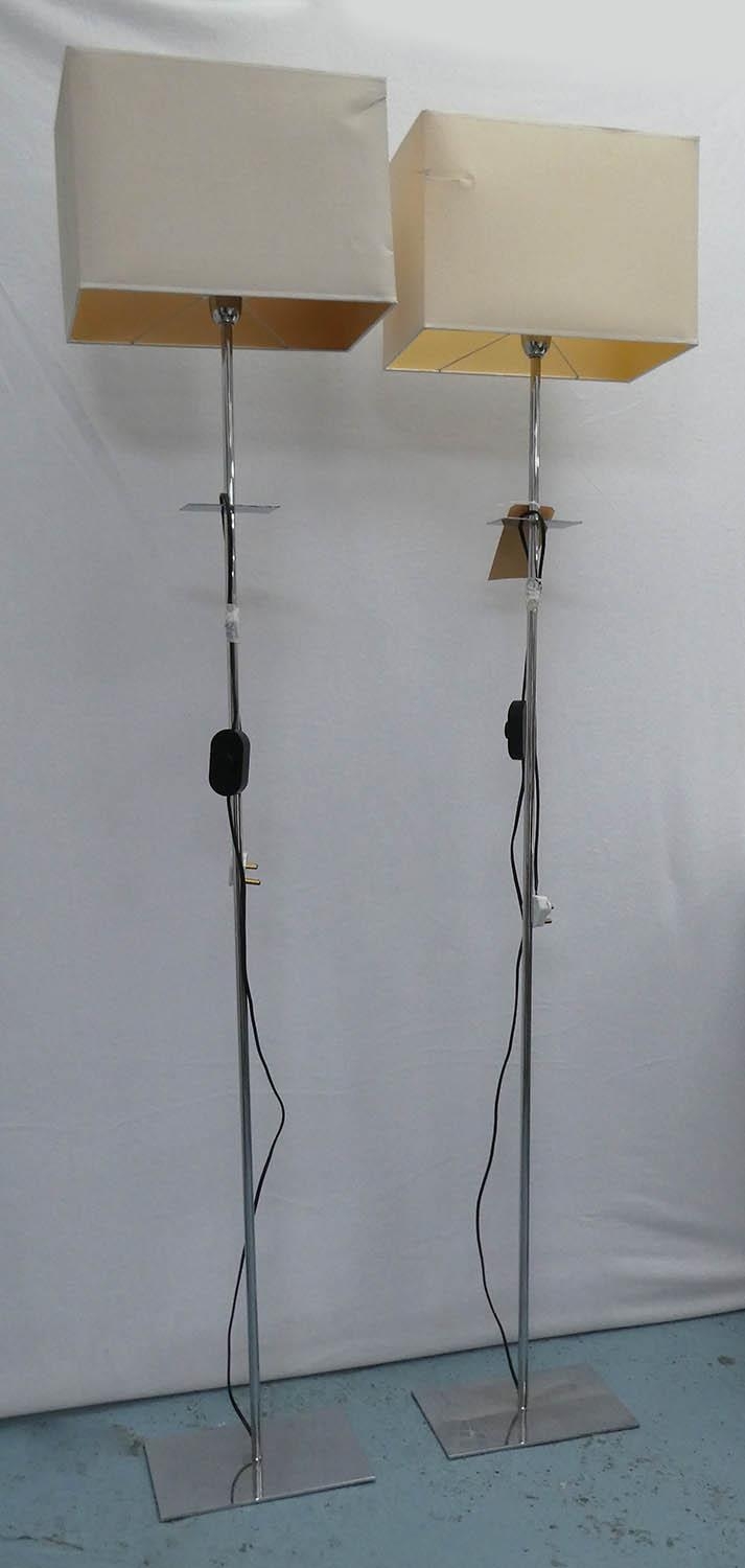 FLOOR LAMPS, a pair, contemporary polished metal, 175cm H. (2)