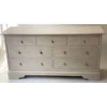 LOW CHEST, French style, traditionally grey painted with seven drawers and silvered metal handles,