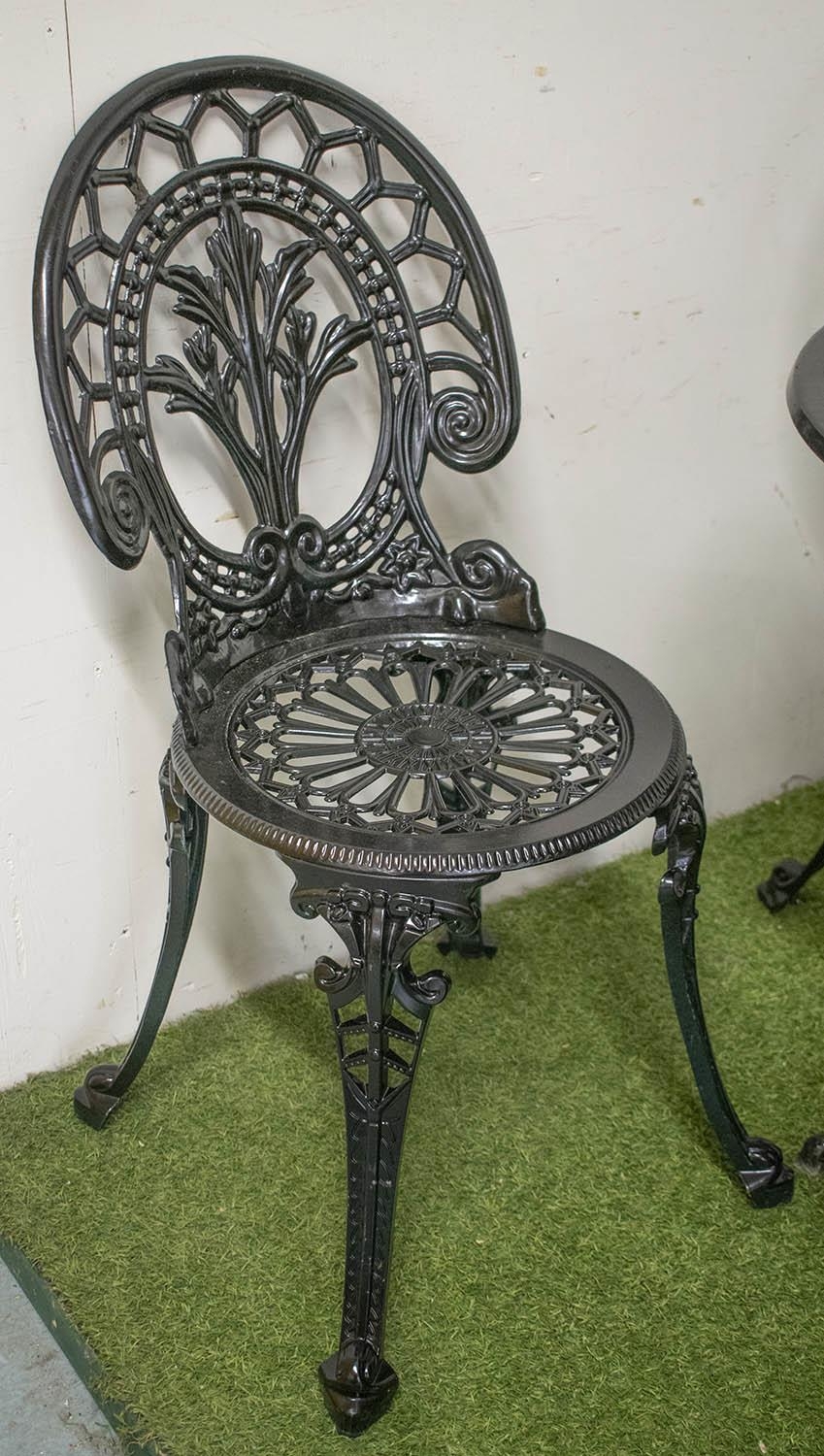 GARDEN SET INCLUDING TABLE, black painted metal with circular top, 69cm and a set of four chairs. ( - Image 2 of 3