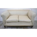 CHESTERFIELD SOFA, Victorian walnut with two seat cushions in patterned cream material on ceramic