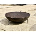 KADAI FIRE BOWL, on stand with aged lid, 158cm Diam x 58cm H.