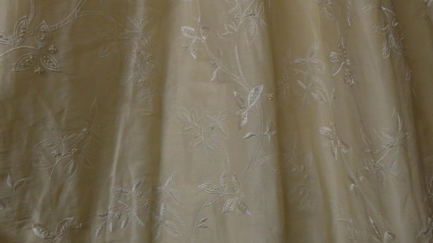 CURTAINS, two pairs in an embroidered ivory silk, lined and interlined, one pair each curtain approx - Image 2 of 4