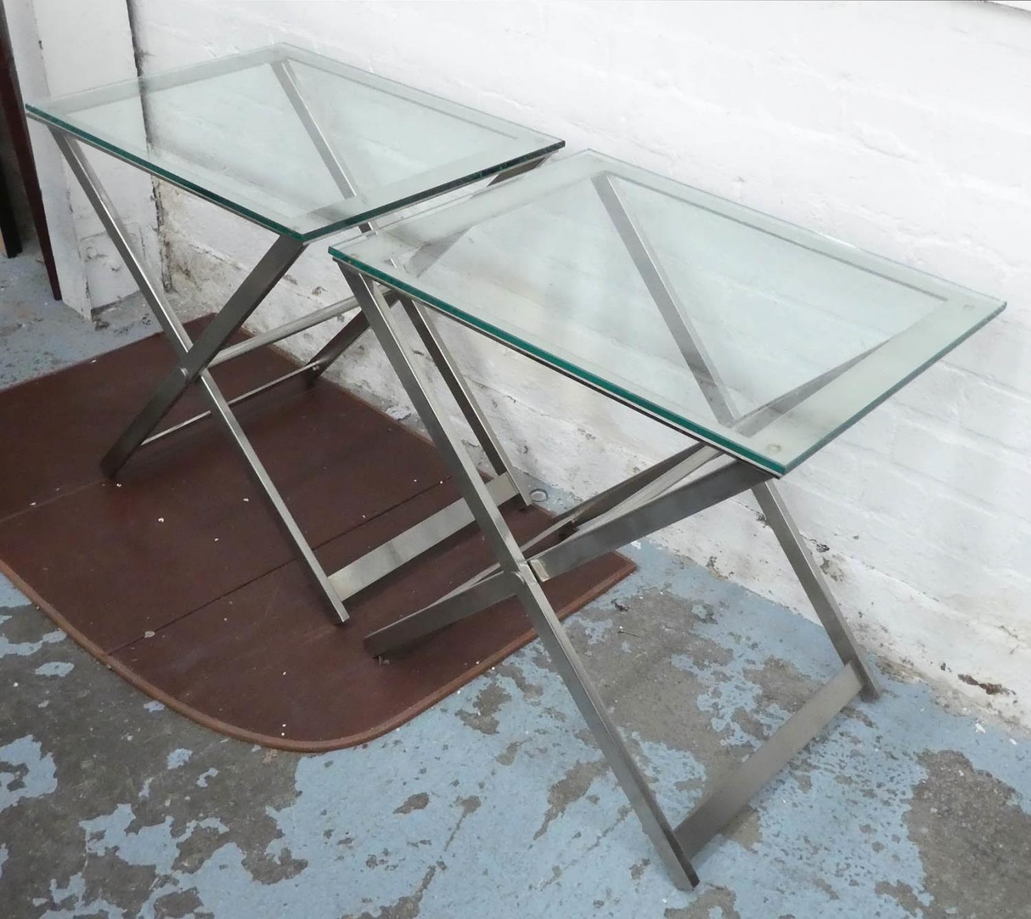 SIDE TABLES, a pair, contemporary polished metal and glass (scratches to glass) 45cm x 60cm x