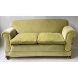 SOFA, early 20th century Edwardian chalk yellow velvet upholstered with drop arm, 175cm W.