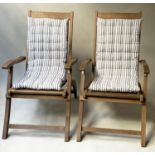 GARDEN 'LOUNGER' ARMCHAIRS, a pair, solid weathered teak, finely slatted and reclining multi