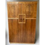 WARDROBE, Art Deco figured walnut with two panelled doors, sphere detail, enclosing double hanging
