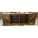 BOOKCASE, Victorian burr walnut, walnut, satinwood and ebonised, circa 1860, with two mask carved