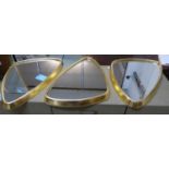 WALL MIRRORS, a set of three, 1950's Italian style, gilt frames, 41cm x 61cm. (3)