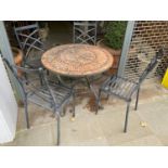 GARDEN TABLE AND CHAIRS, circular mosaic brick top on a cast iron base, 73cm H x 90cm x 90cm, with