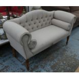 SOFA, Victorian style neutral button back upholstered on turned supports with castors, 130cm W.