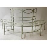 TREE BENCH, vintage semi circular weathered wrought iron with ribbon upstand back, 180cm W,